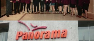Tourism stream students pose in and out of panorama Tour office